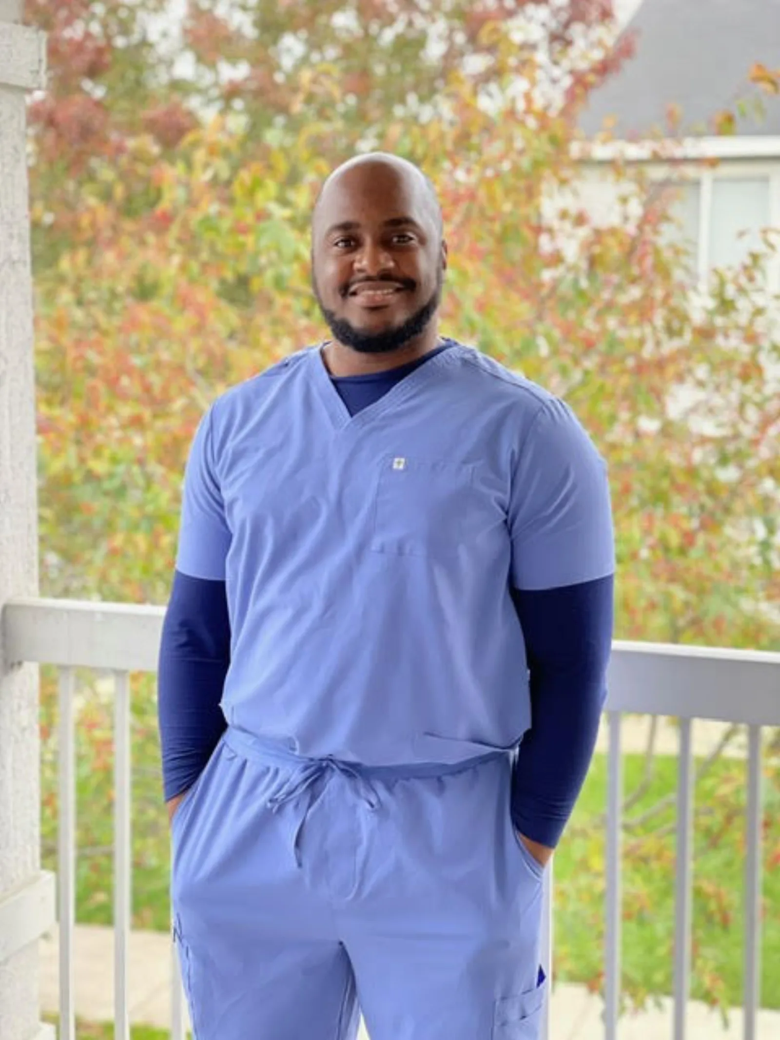 Dr. Alton Johnson, podiatrist, in medical scrubs